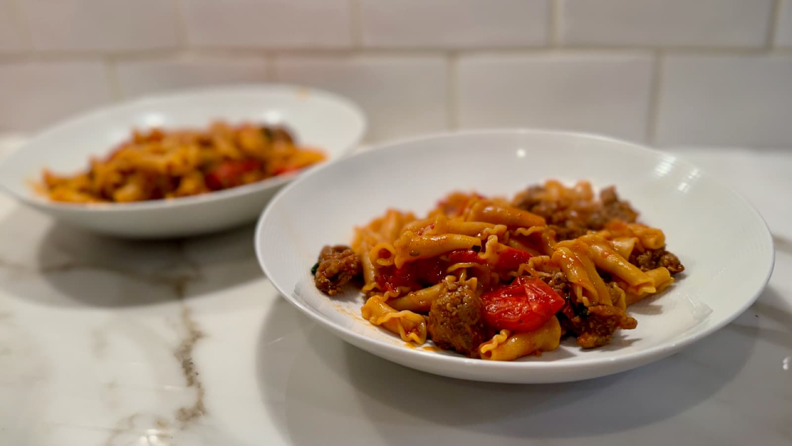 Campanelle Pasta with Sausage and Cherry Tomatoes