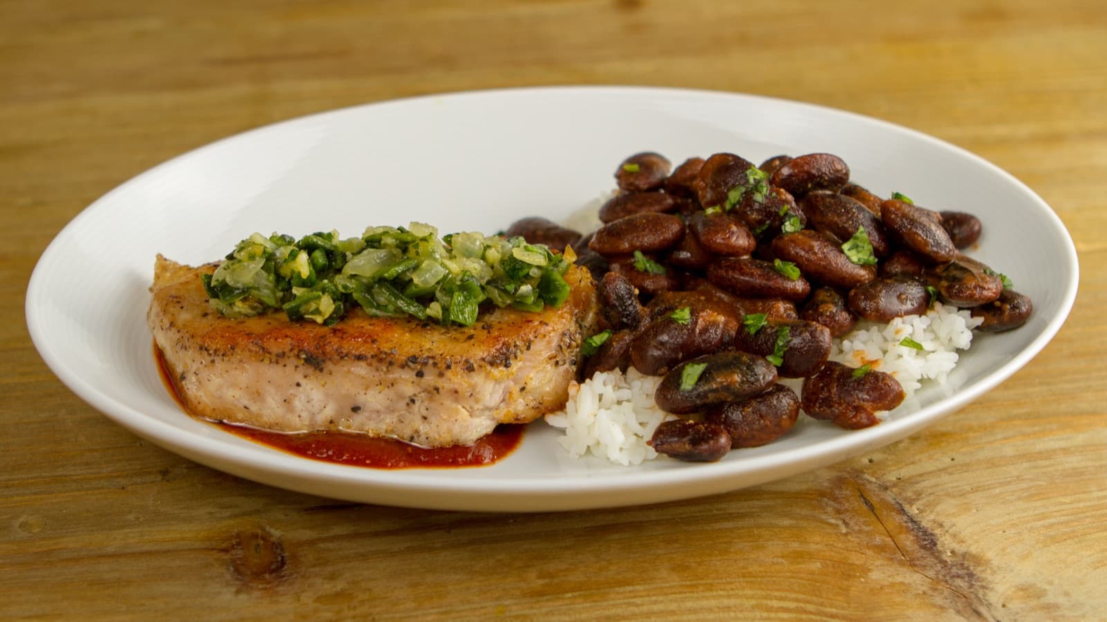 Pork Chops with Roasted Poblano Sofrito, Scarlett Runner Beans, and Rice
